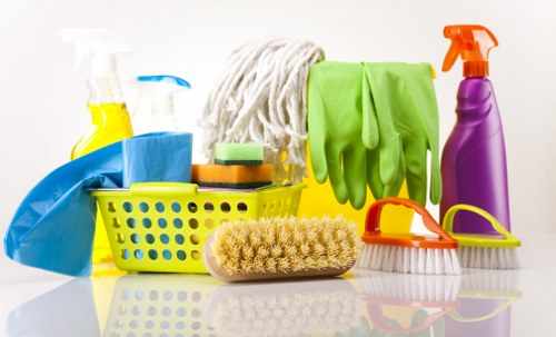 Carpet cleaning technician preparing equipment safely before work